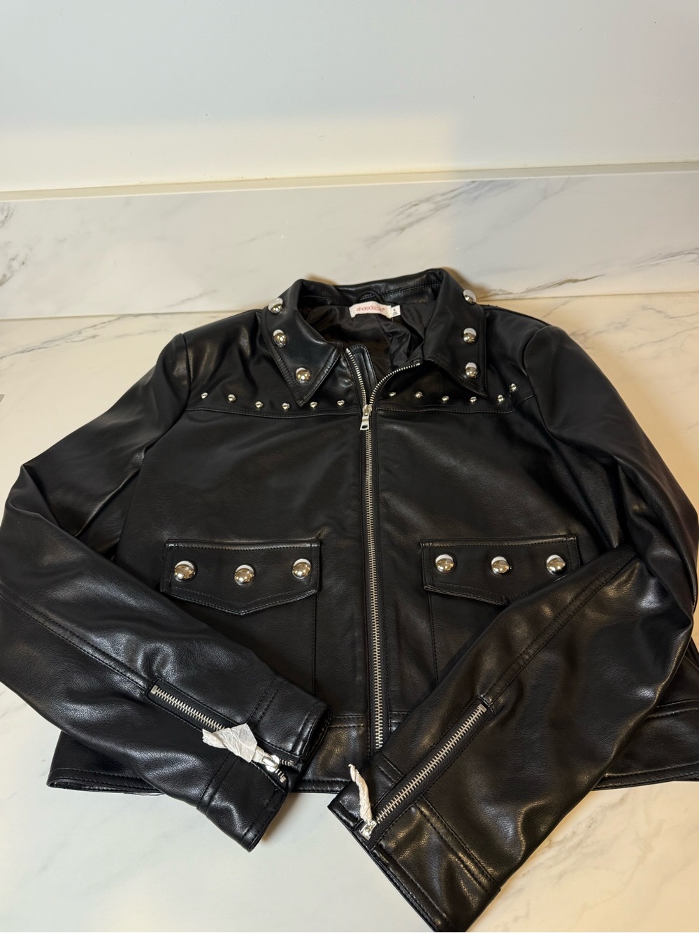 Black faux leather studded jacket